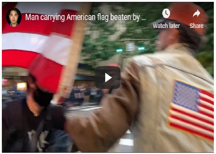 A Man Carrying An American Flag Assaulted By Extreme Minority
